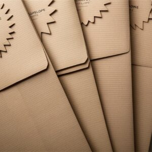 Custom corrugated envelopes are a type of packaging specifically designed for shipping flat or relatively thin items that require more protection than standard paper envelopes but don't necessarily need a full cardboard box.